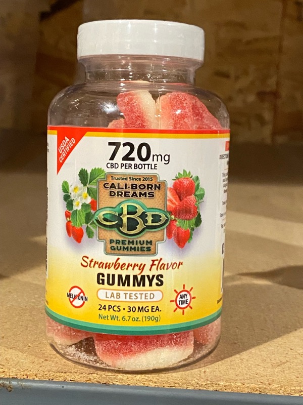 an image of a clear can of CBD strawberry gummy's from Cali Born Dreams.