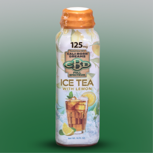 An image of a yellow bottle of CBD-infused Ice Tea from Cali Born Dreams, with a label displaying the product name, dosage, and ingredients. The bottle is placed on a green background, with droplets of condensation visible on its surface, indicating its chilled temperature